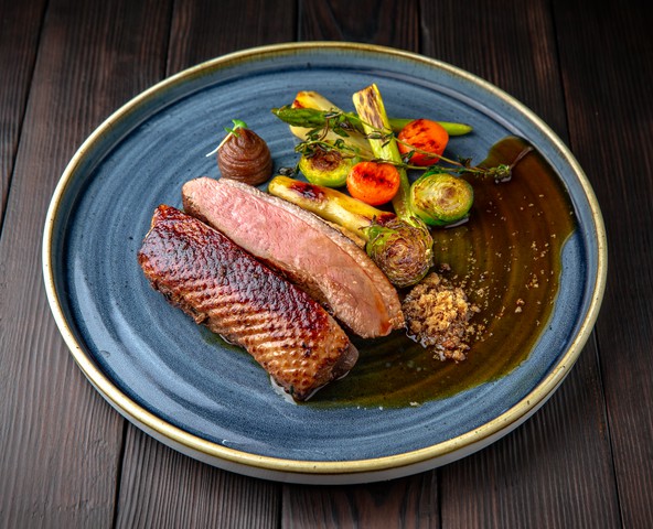 Duck breast with asparagus, Brussels sprouts and date puree