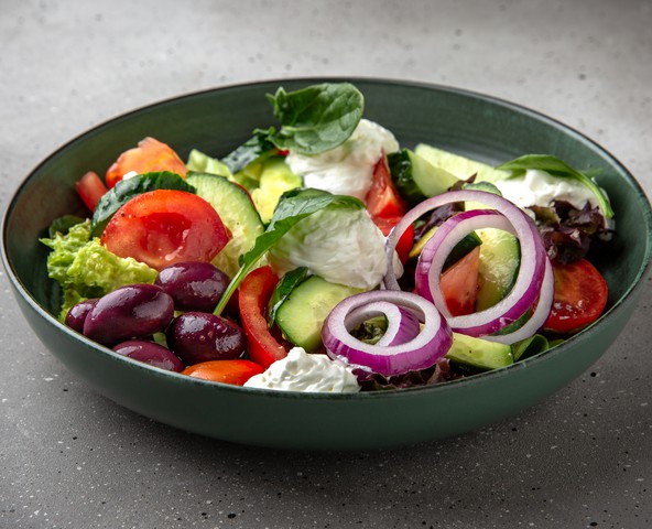 Vegetable salad with kalamata olives and feta cream