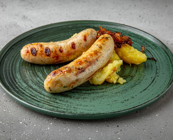 Chicken bratwurst - sausages with green onions and herbs