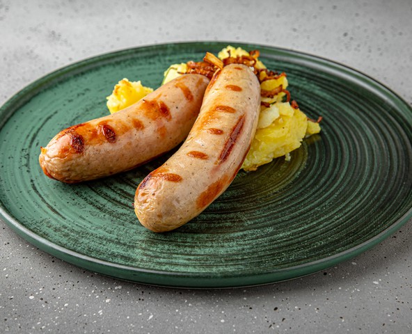 Turkey bratwurst - sausages with pork speck and spice