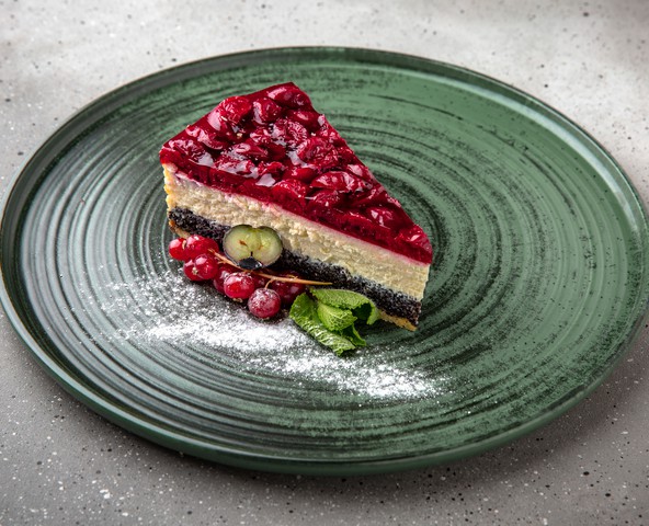 Layered cheesecake with poppy seeds and cherry confit
