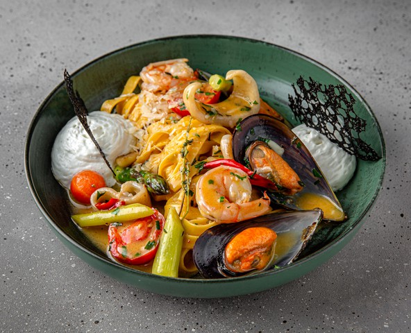 Tagliatelle with seafood in creamy sauce