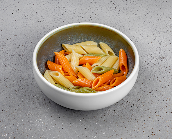 Colored penne pasta with butter