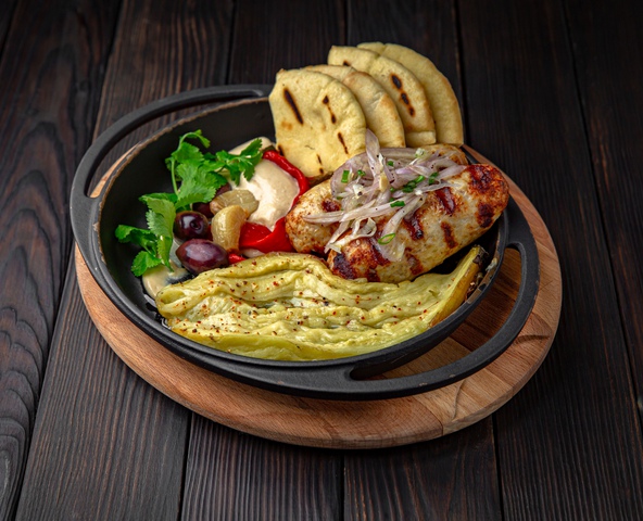Chicken lula-kebab with tahini and eggplant