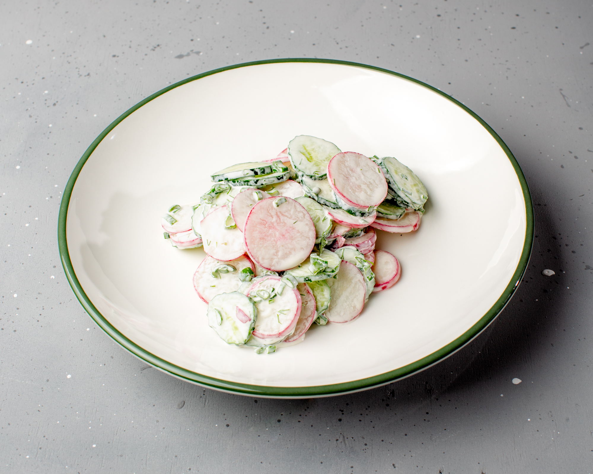 Salad with radish, cucumber, and green onion
