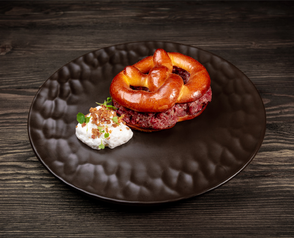Pretzel with veal tartare and guanciale cream
