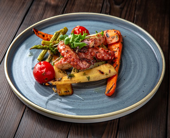 Charcoal grilled octopus with vegetables